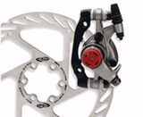 Інші достоїнства дискових гальм: Вони не бояться вісімок на ободі, так як закріплені прямо на втулці колеса